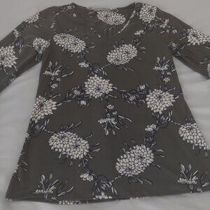 Ladies top. 3/4 sleeve, deep grey with floral white & blue. Med